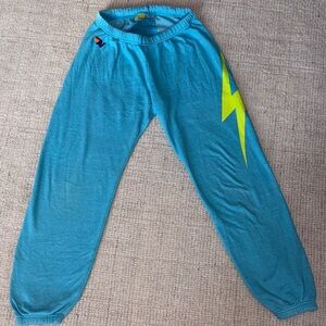 Aviator Nation Teal sweats with Yellow Sun Graphic